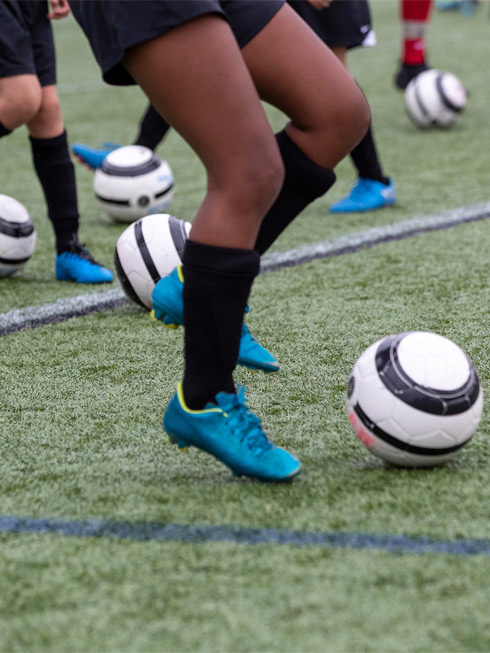 close up of legs and football boots, camp training, football coaching