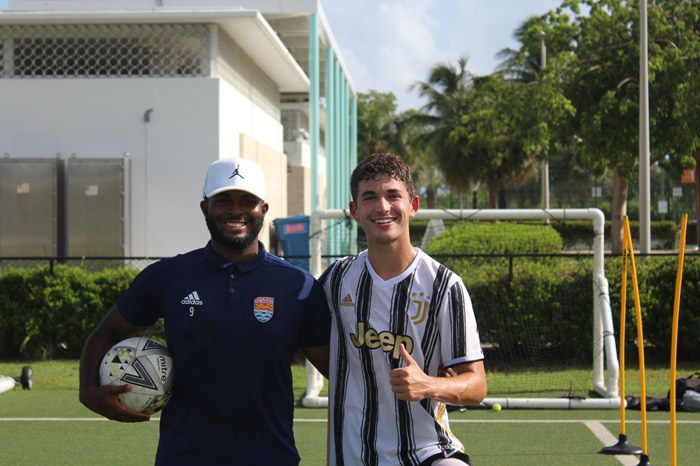 coach Kray Foster, smiling with client