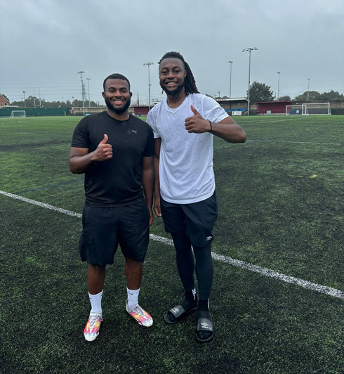 Kray Foster, professional football coach, and client with thumbs up